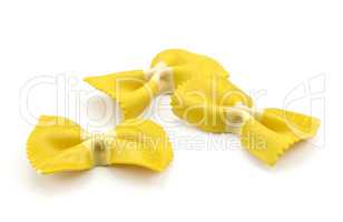 Colourful raw farfalle isolated on white