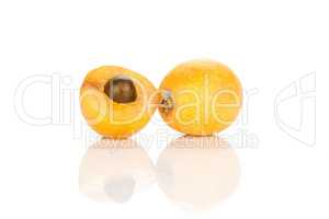 Fresh raw orange japanese loquat isolated on white