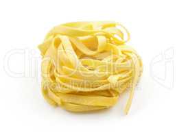 Raw fresh Fettuccine isolated on white