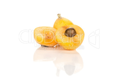 Fresh raw orange japanese loquat isolated on white