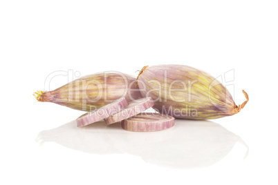 Fresh raw long shallot onion isolated on white