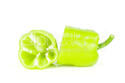 Fresh raw light green pepper isolated on white