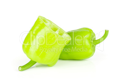 Fresh raw light green pepper isolated on white