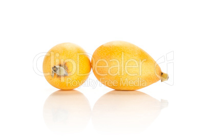 Fresh raw orange japanese loquat isolated on white