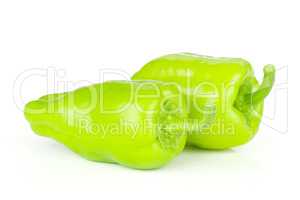 Fresh raw light green pepper isolated on white