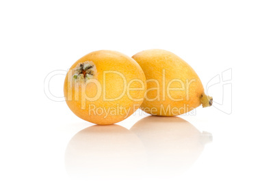 Fresh raw orange japanese loquat isolated on white