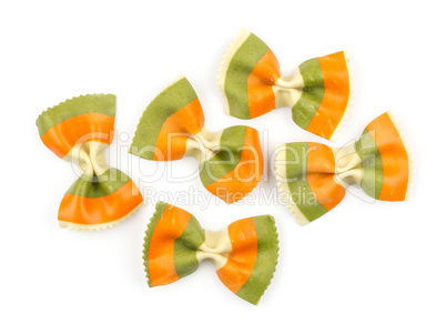 Colourful raw farfalle isolated on white