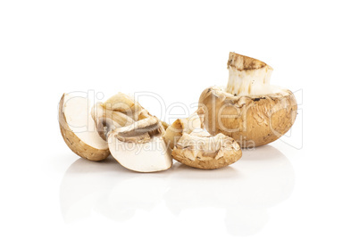 Fresh raw brown champignons isolated on white