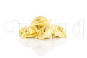 Fresh Raw tortellini pasta isolated on white