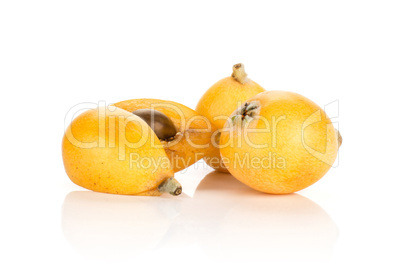 Fresh raw orange japanese loquat isolated on white