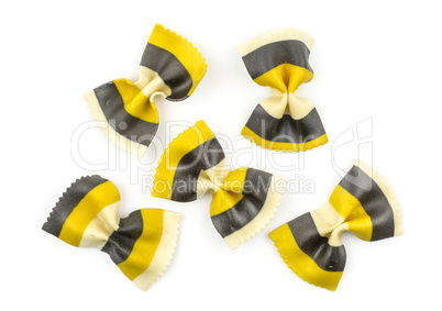 Colourful raw farfalle isolated on white