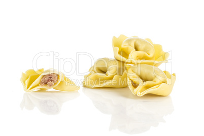 Fresh Raw tortellini pasta isolated on white