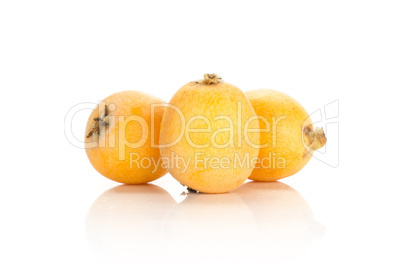 Fresh raw orange japanese loquat isolated on white