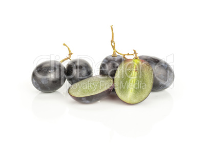 Fresh Black Wine Grapes isolated on white