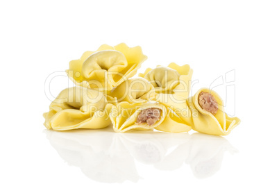 Fresh Raw tortellini pasta isolated on white