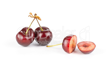 Fresh raw sweet red cherry isolated on white