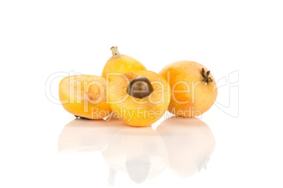 Fresh raw orange japanese loquat isolated on white