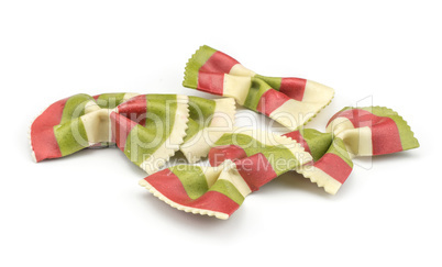 Colourful raw farfalle isolated on white