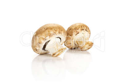 Fresh raw brown champignons isolated on white