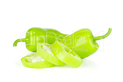 Fresh raw light green pepper isolated on white