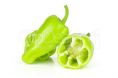 Fresh raw light green pepper isolated on white