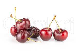 Fresh raw sweet red cherry isolated on white