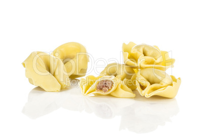 Fresh Raw tortellini pasta isolated on white