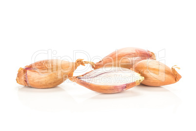 Fresh raw long shallot onion isolated on white