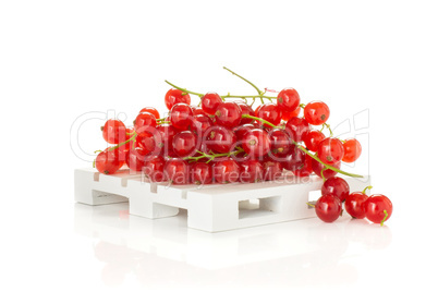 Fresh raw red currant isolated on white