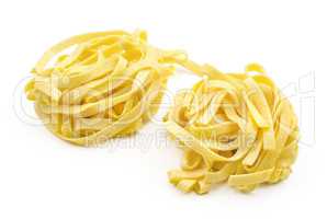 Raw fresh Fettuccine isolated on white