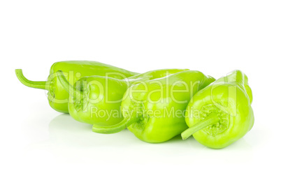 Fresh raw light green pepper isolated on white