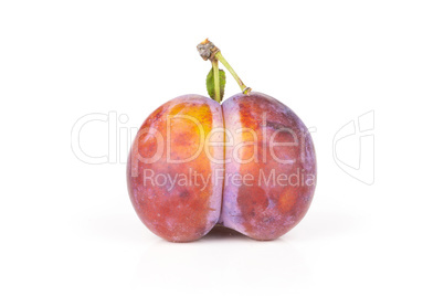 Fresh Raw vibrant plums isolated on white