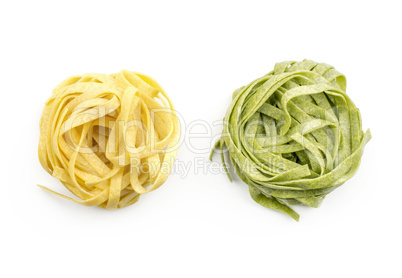 Raw fresh Fettuccine isolated on white