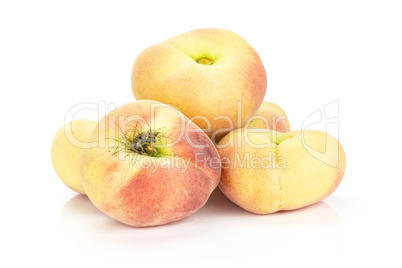 Fresh raw saturn peach isolated on white