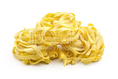 Raw fresh Fettuccine isolated on white