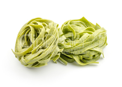 Raw fresh Fettuccine isolated on white