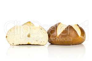 Fresh Bavarian bread bun isolated on white