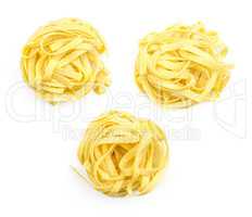 Raw fresh Fettuccine isolated on white