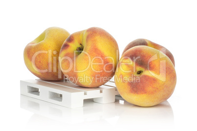 Fresh Raw yellow peach isolated on white