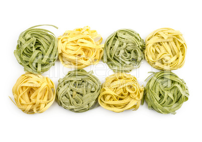 Raw fresh Fettuccine isolated on white