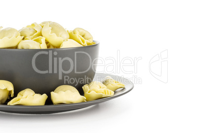 Fresh Raw tortellini pasta isolated on white