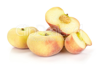 Fresh raw saturn peach isolated on white