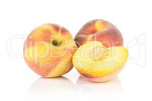 Fresh Raw yellow peach isolated on white