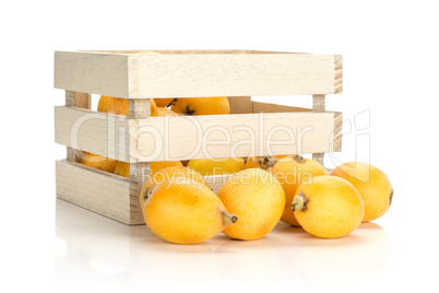 Fresh raw orange japanese loquat isolated on white