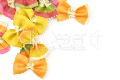 Colourful raw farfalle isolated on white