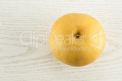 Fresh Nashi golden pear isolated on white