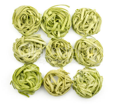 Raw fresh Fettuccine isolated on white