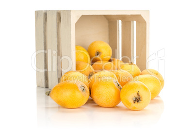 Fresh raw orange japanese loquat isolated on white