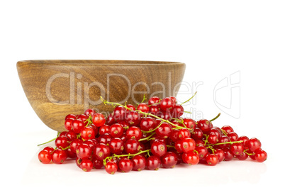 Fresh raw red currant isolated on white