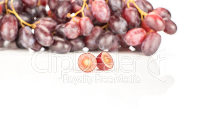 Raw fresh red globe grape isolated on white